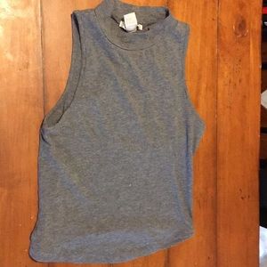 A turtle neck tank top